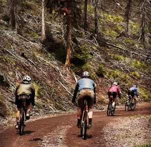 gravel cyclists on a dirt road