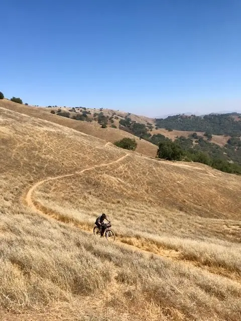 High side unclipping cycling tips demonstrated on single track traverse